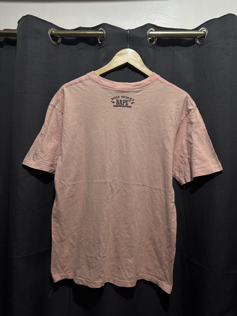 A Bathing Ape (BAPE) Oversized Ape Head Graphic Tee (Category: Tshirts & Polo Shirts ) located in Buenavista. Submitted by themodernrack (Listing ID 1470599305, Image 2). Description: Condition: Excellent Condition Measurements & Sizing: Size: Tagged Size Medium (BAPE classic relaxed fit; fits like Men’s M/L) Width (Pit to Pit): 20” Length: 27”.