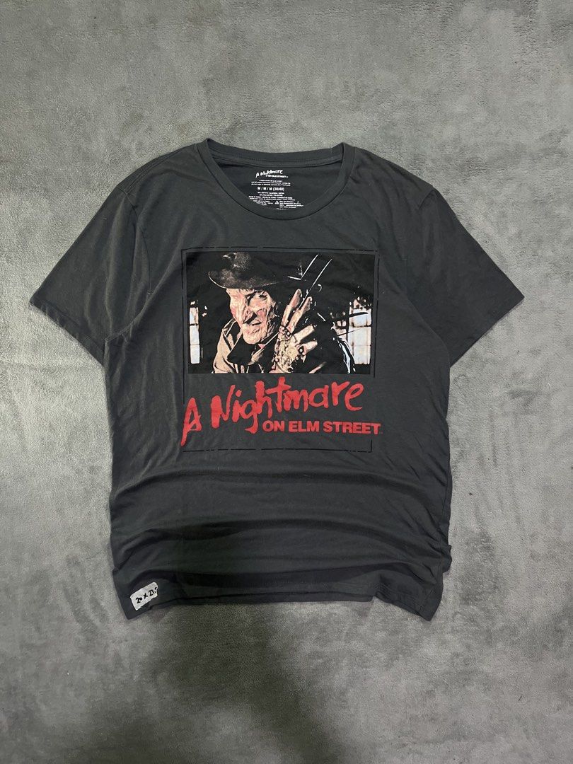 A nightmare on Elm Street (Category: Tshirts & Polo Shirts ) located in Manila. Submitted by ichann.lrdzbl (Listing ID 1470669410, Image 1). Description: • DIMENSION Width: 20 Length: 27.5 Size: Medium ‘ DETAILS Issue: Need Wash, Condition Rate: 9/10 Color Rate: 9/10.