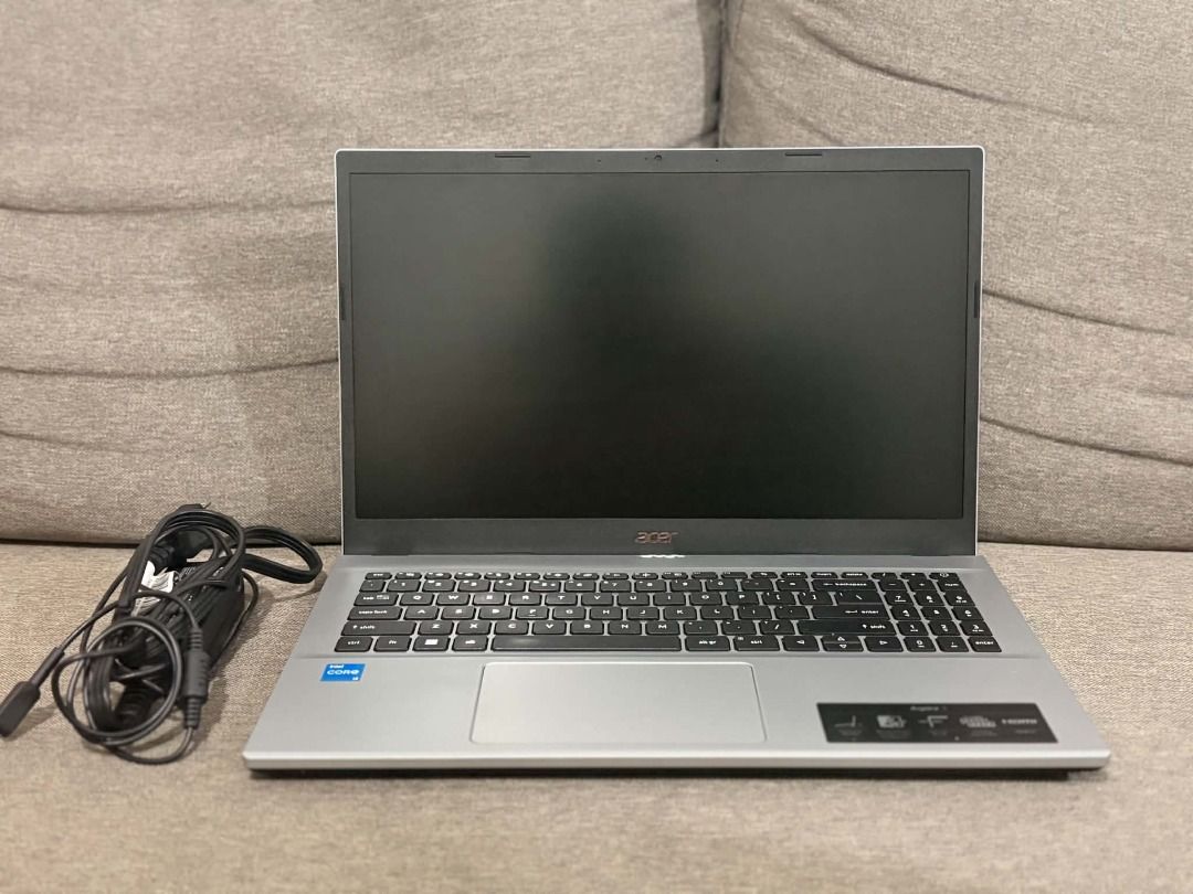 Acer Aspire Laptop with Charger (Category: Laptops & Notebooks) located in Cebu City. Submitted by pricedrop_12345 (Listing ID 1470578513, Image 2). Description: - Brand: Acer Aspire - Color: Silver - Condition: Clean chassis with minimal exterior wear - Keyboard: Full-size with numeric keypad and trackpad - Inclusions: Original power adapter and cable - Status: Ready for setup.