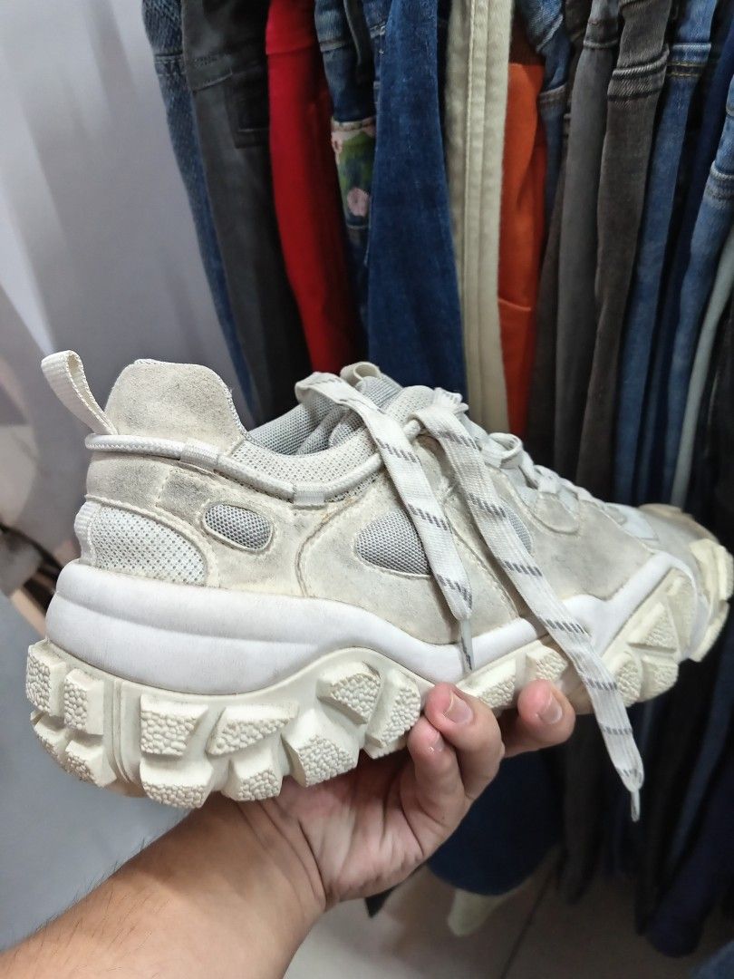 Acne Studios Off-White Chunky Sneakers (Category: Sneakers) located in Manila. Submitted by sonny2k (Listing ID 1470678349, Image 2). Description: - Brand: Acne Studios - Style: Chunky sculpted sneakers - Color: Off-white - Size: EU44 - Materials: Mesh and suede upper with sculpted rubber sole - Details: Embossed logo on bottom, speckled patterned laces, and heel pull tab - Origin: Made in China - Condition: Minor signs of wear on the outsole.