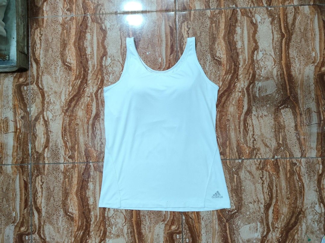 Adidas 2in1 Climalite Tank (Category: Activewear) located in General Santos City (Dadiangas). Submitted by alfredanth42291 (Listing ID 1470621348, Image 1). Description: ADIDAS CLIMALITE 2in1TANK white womens S-M W: 15-17.5 L: 22 -w/ inner sports bra -paded -quickdry note: -cracked print very good condition 185.