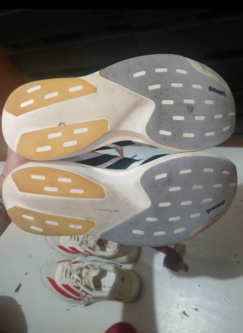 Adidas Adizero Running Shoes (Category: Shoe inserts & accessories) located in Manila. Submitted by jonwick31 (Listing ID 1470641070, Image 3). Description: - Bundle includes 2 pairs of Adidas Adizero running shoes: White/Red and White/Black - Ultra-lightweight mesh boths size 11 no box OEM po ito 2500 for both as pack only qc.