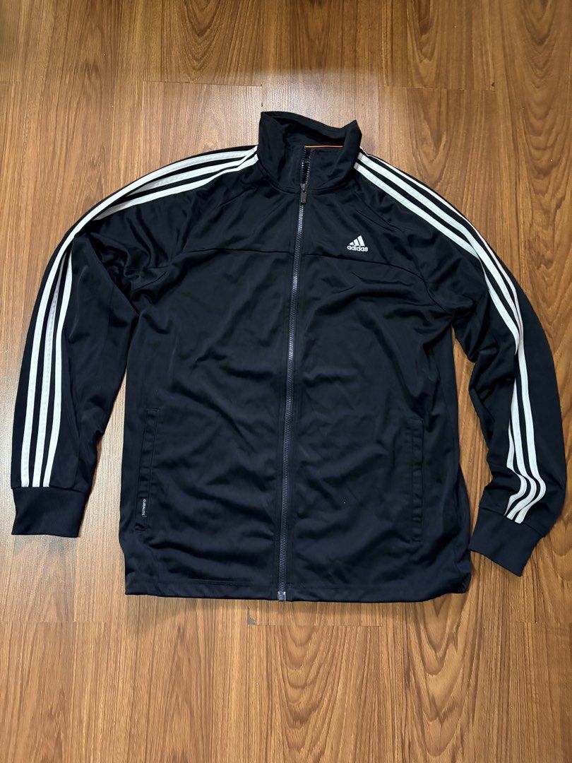 Adidas Climalite Black Track Jacket (Category: Activewear) located in Baguio. Submitted by rexyellowblue (Listing ID 1470617859, Image 2). Description: - Brand: Adidas - Color: Black with white three stripes - Size: Medium - Material/Tech: Climalite technology fabric - Features: Zip-up front, high collar, embroidered chest logo - Condition: Clean, excellent overall condition.