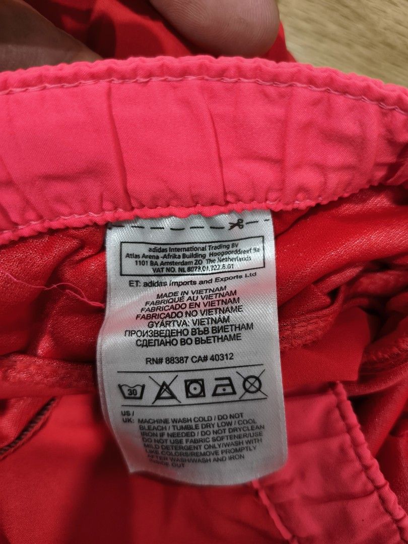 Adidas Climalite Pink Running Shorts Medium (Category: Activewear) located in Munoz. Submitted by toy_zone (Listing ID 1470674905, Image 2). Description: - Brand: Adidas - Color: Bright Pink - Material: Lightweight Climalite fabric for maximum comfort and breathability - Fit: Elastic waistband with adjustable drawstring - Design: Iconic three stripes on the sides - Origin: Made in Vietnam - Condition: Great for running, workouts, or casual wear N