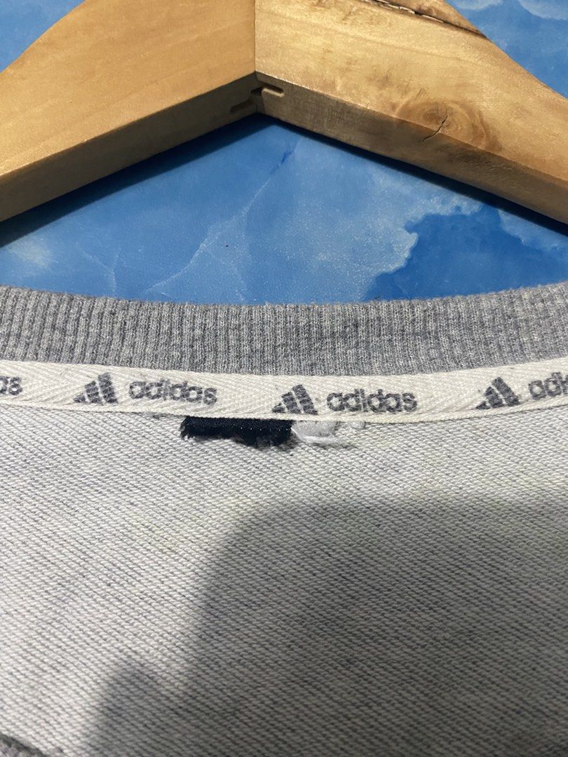 Adidas crewneck (Category: Coats, Jackets and Outerwear) located in Binan City. Submitted by rnj_affordable (Listing ID 1470728749, Image 3). Description: cut tags.