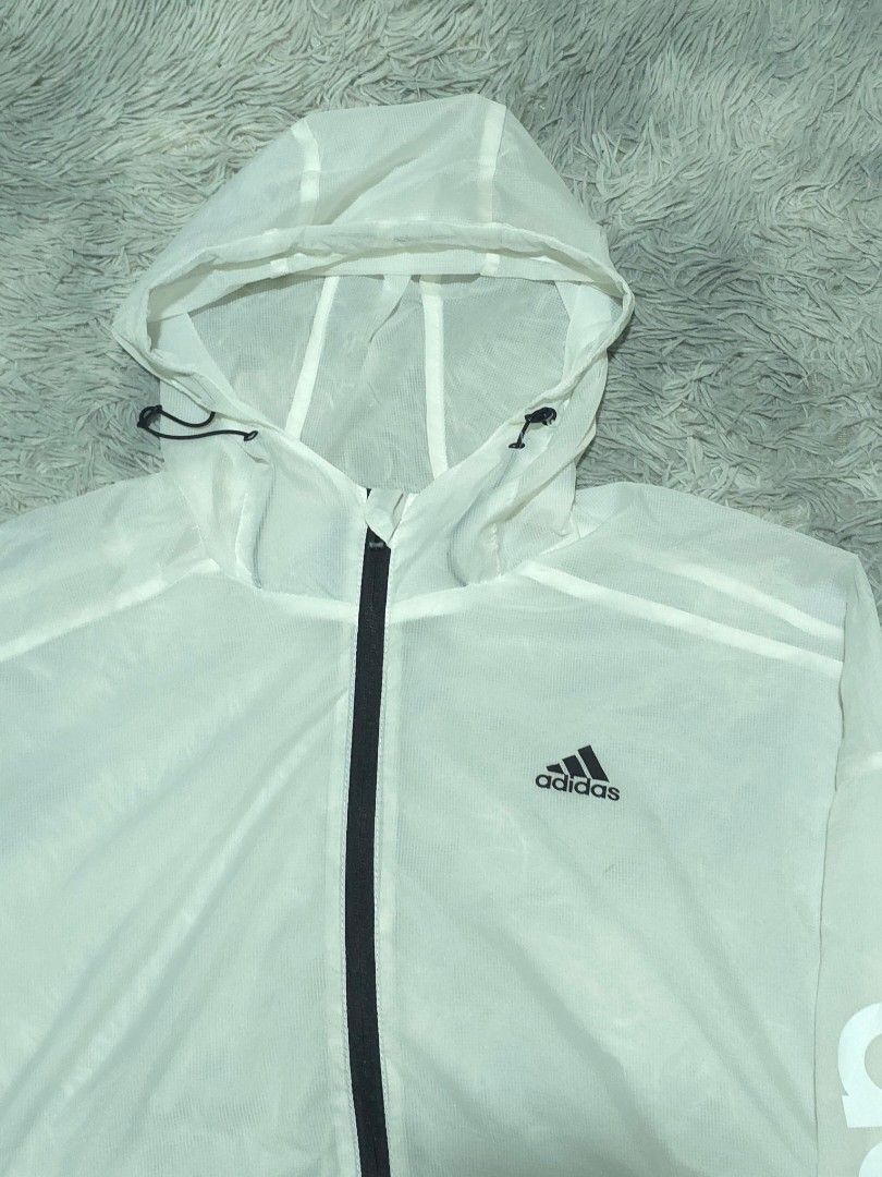 Adidas Lightweight Windbreaker (Category: Coats, Jackets and Outerwear) located in Abulug. Submitted by humanwhosellthings (Listing ID 1470560357, Image 3). Description: ADIDAS LIGHTWEIGHT WINDBREAKER JACKET ✅️Size: Small on tag fit to Medium ✅️Dimes: 20W x 26L ✅Condition: Excellent ✅Issue: needs wash only ✅Color Rate: 9.8/10.