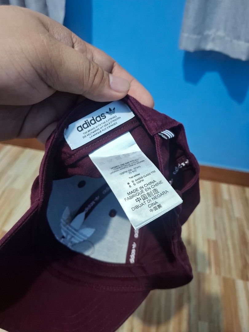 Adidas Maroon Baseball Cap Trefoil Logo (Category: Caps & Hats) located in Cagayan de Oro. Submitted by ramjim.newaccount (Listing ID 1470579265, Image 3). Description: - Brand: Adidas - Color: Rich maroon with white embroidered Trefoil logo - Size: OSFW (Adjustable back strap) - Details: Branded interior tape lining and original tags - Origin: Made in China - Condition: Clean structure, vibrant color, ready to wear.
