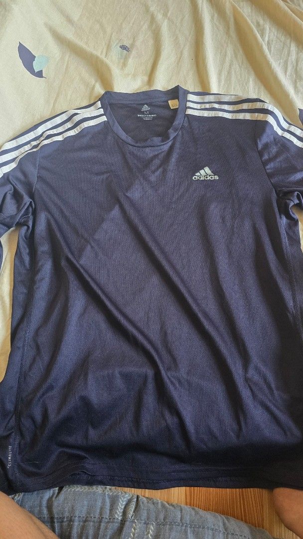 Adidas Sportswear Jacket Bundle Lot (Category: Coats, Jackets and Outerwear) located in Manila. Submitted by karlculus26 (Listing ID 1470617609, Image 3). Description: - 4-piece Adidas bundle for workouts and casual wear - Includes grey windbreaker, navy blue tee with white stripes, black hoodie, and navy track jacket - Iconic Adidas branding and signature stripe details on all items - Sizes and materials vary per piece - Great value lot to insta