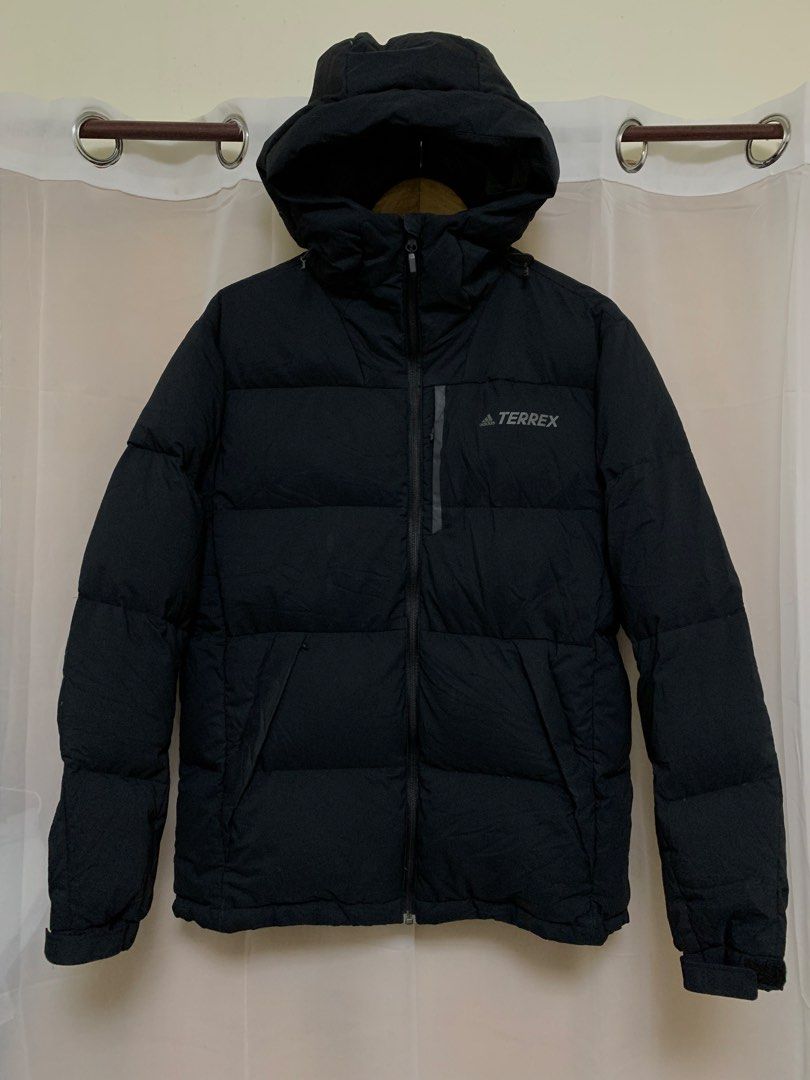 Adidas Terrex Black Puffer Jacket With Hood (Category: Coats, Jackets and Outerwear) located in Naga. Submitted by manabatjoh72100 (Listing ID 1470579669, Image 1). Description: ADIDAS TERREX PUFFER JACKET😍 Excellent condition to new No issue Color rate 10/10 Width 23.5 Length 28.5 Price+sf Message me for sure buyer📩 Loc. Naga Cebu.