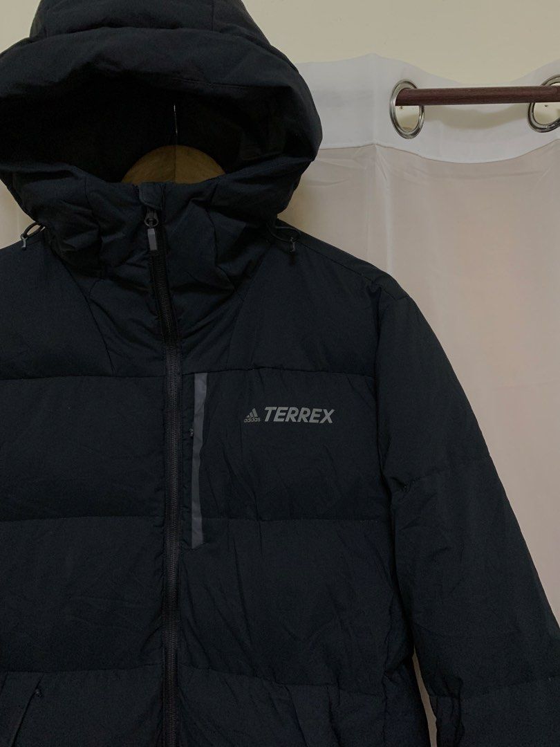 Adidas Terrex Black Puffer Jacket With Hood (Category: Coats, Jackets and Outerwear) located in Naga. Submitted by manabatjoh72100 (Listing ID 1470579669, Image 2). Description: ADIDAS TERREX PUFFER JACKET😍 Excellent condition to new No issue Color rate 10/10 Width 23.5 Length 28.5 Price+sf Message me for sure buyer📩 Loc. Naga Cebu.