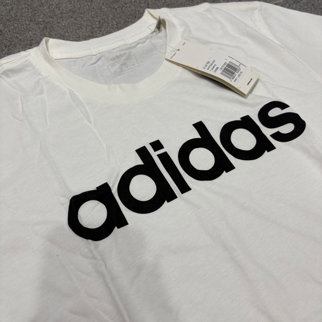 Adidas White Essentials Linear Logo Tee (Category: Tshirts & Polo Shirts ) located in San Fernando. Submitted by louluntian (Listing ID 1470659058, Image 3). Description: 𝐂𝐨𝐧𝐝𝐢𝐭𝐢𝐨𝐧: Needs washing | No issues 𝐋𝐨𝐜𝐚𝐭𝐢𝐨𝐧: Pampanga 𝐌𝐎𝐏: GCASH Only 𝐂𝐨𝐮𝐫𝐢𝐞𝐫: Lalamove | J&T Express (Shipping fee c/o buyer) .