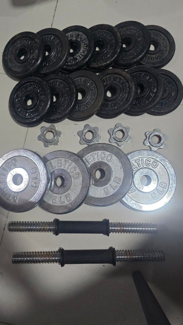Adjustable Dumbbell Set with Weight Plates and Spinlock Collars (Category: Weights & Dumbbells) located in Caloocan City. Submitted by marces (Listing ID 1470607580, Image 1). Description: - Complete home gym dumbbell set, perfect for strength training - 2x metal spinlock dumbbell bars with secure threaded ends - 4x 5 lb silver Atletico weight plates - 12x 2.5 lb black Authority Sports weight plates - 4x star-lock collars included for safe and ea