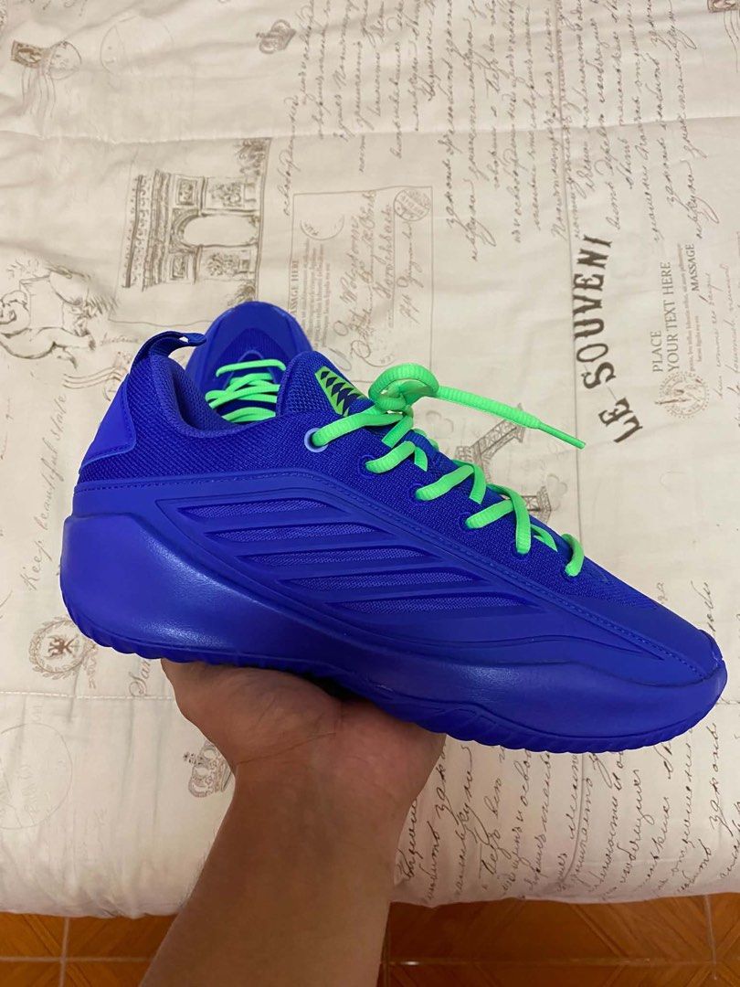 AE Believe that 1 (Category: Sneakers) located in Batangas. Submitted by dcastrogwe16756 (Listing ID 1470637083, Image 2). Description: - Color: Royal blue mesh upper with vibrant lime green laces and accents - Details: Signature branding on the tongue and heel pull tab - Performance: Textured herringbone outsole providing great grip for the court - Condition: Clean shape with zero scuffs and no heel drag on the soles.
