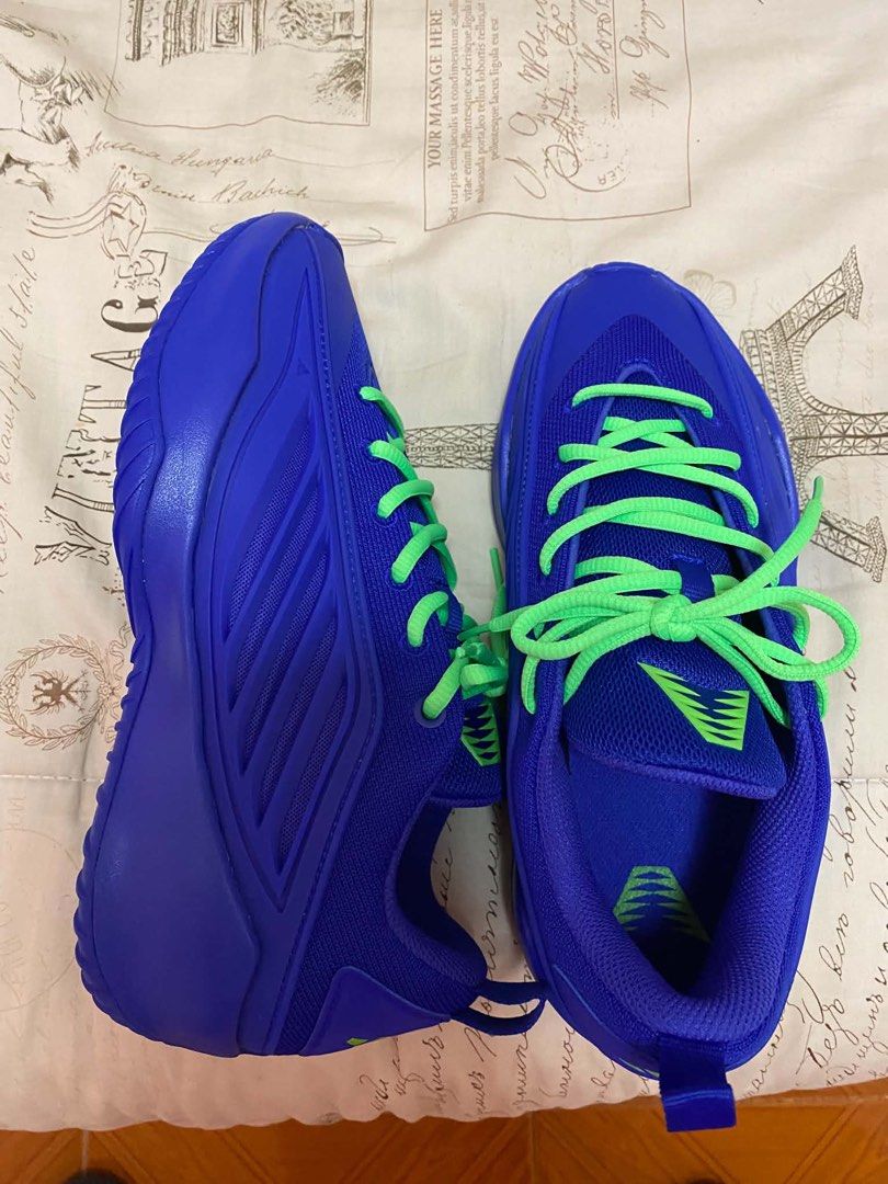 AE Believe that 1 (Category: Sneakers) located in Batangas. Submitted by dcastrogwe16756 (Listing ID 1470637083, Image 3). Description: - Color: Royal blue mesh upper with vibrant lime green laces and accents - Details: Signature branding on the tongue and heel pull tab - Performance: Textured herringbone outsole providing great grip for the court - Condition: Clean shape with zero scuffs and no heel drag on the soles.
