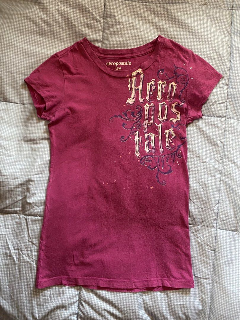 Aeropostale Pink Tee (Category: Blouses) located in General Santos City (Dadiangas). Submitted by versatile__ (Listing ID 1470616885, Image 1). Description: y2K Aeropostale Pink Tee Tagged Medium width : 14 inches length : 24 inches Good Condition- Nine out Ten Color Rate Featuring Good early 00’s design on front area -Flaw(s): washable dirt/ dirt stain +Shipping Fee.