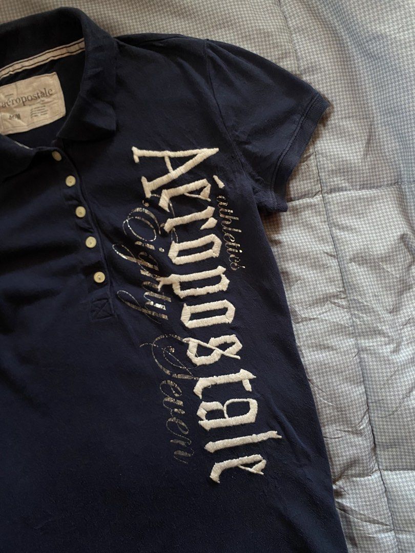 Aeropostale y2K Polo (Category: Blouses) located in General Santos City (Dadiangas). Submitted by versatile__ (Listing ID 1470618828, Image 3). Description: Y2K Aeropostale Polo Tee Tagged Medium width: Almost 15 inches length: 25 inches Good Condition - Nine out Ten Color Rate Featuring -Featuring good embroidery deisgn on front area -flaw(s):washable dirt,super tiny hhole need wash! +Shipping Fee.