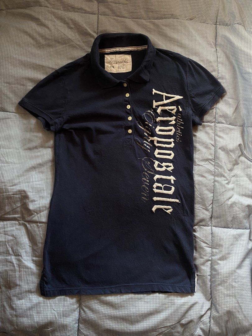 Aeropostale y2K Polo (Category: Blouses) located in General Santos City (Dadiangas). Submitted by versatile__ (Listing ID 1470618828, Image 1). Description: Y2K Aeropostale Polo Tee Tagged Medium width: Almost 15 inches length: 25 inches Good Condition - Nine out Ten Color Rate Featuring -Featuring good embroidery deisgn on front area -flaw(s):washable dirt,super tiny hhole need wash! +Shipping Fee.