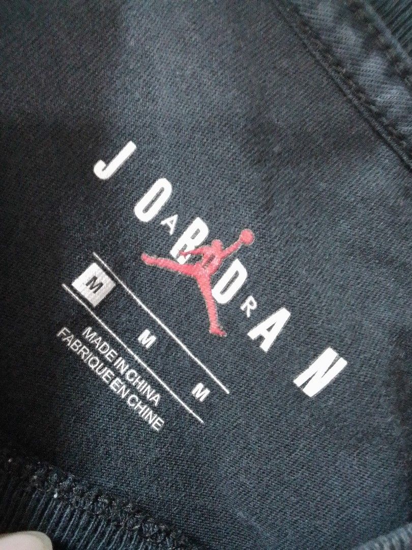Air Jordan Graphic Tee Black (Category: Tshirts & Polo Shirts ) located in Manila. Submitted by jctclthng_2026 (Listing ID 1470618952, Image 3). Description: - Brand: Jordan - Color: Black Graphic Tee - Size: Tag M (Chest: 95cm, Height: 165-175cm) - Condition: Good pre-loved condition, pinhole, slightly unnoticeable..