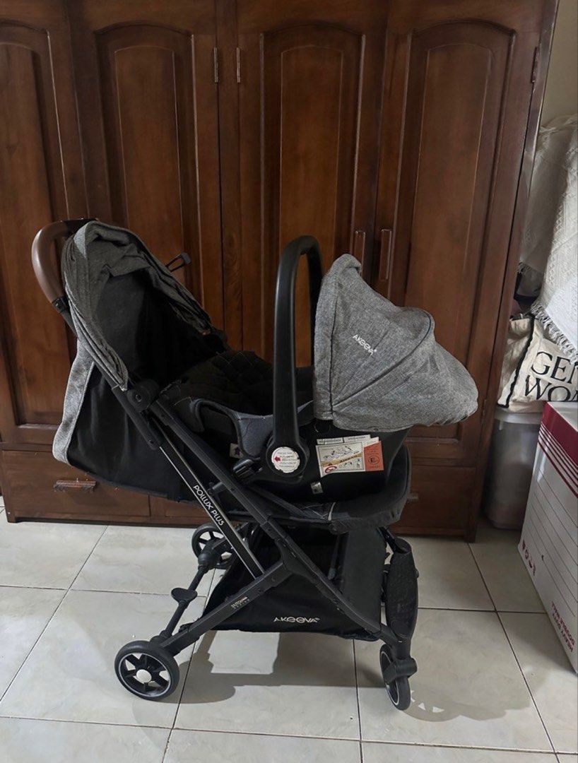 Akeeva Pollux Plus Stroller with Car Seat (Category: Strollers) located in Batangas. Submitted by Cml__ (Listing ID 1470573315, Image 2). Description: - Brand: Akeeva Pollux Plus Travel System (Grey & Black) - Includes: Stroller and matching infant car seat with adjustable canopy and carry handle - Stroller Features: Extendable hood, premium brown leatherette handlebar, and large under-seat storage basket - Frame & Mobility: Sturdy black frame wi