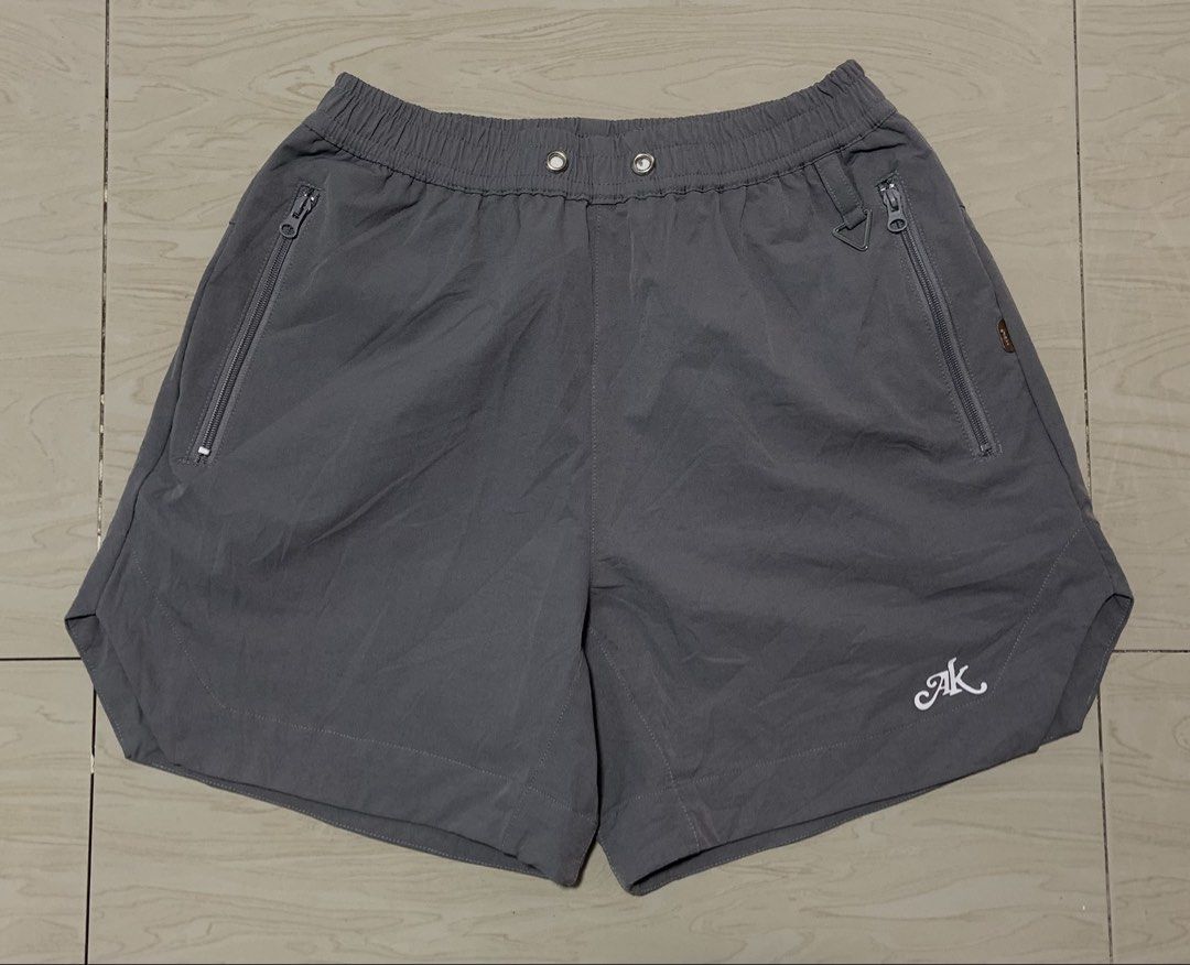 Akzin Grey Athletic Shorts Size M. -missing lace (Category: Activewear) located in Angeles City. Submitted by manlapidma26771 (Listing ID 1470579095, Image 1). Description: - Brand/Model: Akzin grey athletic shorts - Size: Medium - Waistband: Elastic with metal eyelets - Pockets: Secure zipped side pockets with premium YKK zippers - Details: Small white AK logo near the hem and triangle hardware loop near the left pocket.