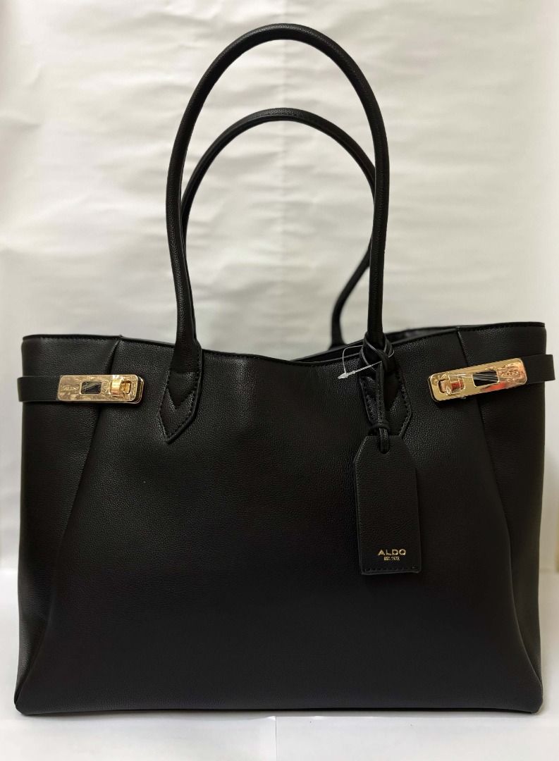 Aldo Black Large Tote Bag with Gold Hardware (Category: Tote Bags) located in Paranaque City. Submitted by cerise_1406 (Listing ID 1470666278, Image 1). Description: VERY NEGOTIABLE - Never Used - Condition: New - Color: Black, with Gold Hardware Dimensions (Tape Measured) Length: Opening-16 in, Bottom-14.5 in Width: 6.3 in Height: 10.5 in.