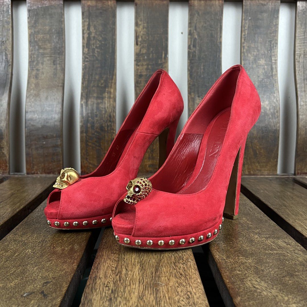 Alexander McQueen Red Suede Skull Peep Toe Platform Pumps. (Category: Sneakers & Footwear) located in Quezon City. Submitted by forgarments (Listing ID 1470721361, Image 1). Description: Alexander McQueen Red Suede Skull Peep Toe Platform Pumps. Excellent Condition - Minor sign of usage Size: 37 Insole: 24 Cm Outsole: 18 Cm Heel height: 13.5 Cm - Red calf suede upper, leather lining - Ornate Gold tone 3D Crystal embellished skull motifs - Stud ac