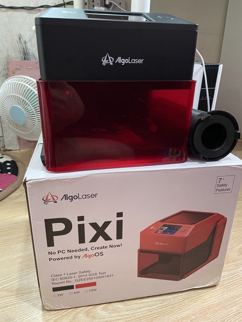 AlgoLaser Pixi Smart Laser Engraver with Rotary Roller (Category: Printers, Scanners & Copiers) located in Manila. Submitted by artypaper_25 (Listing ID 1470662614, Image 3). Description: - AlgoLaser Pixi Smart Laser Engraver 5W black with AlgoOS touchscreen interface - Standalone operation: No PC required - Class 1 laser safety certified for secure use - Includes original retail box, quick start guides, enclosure base, and exhaust attachment - C