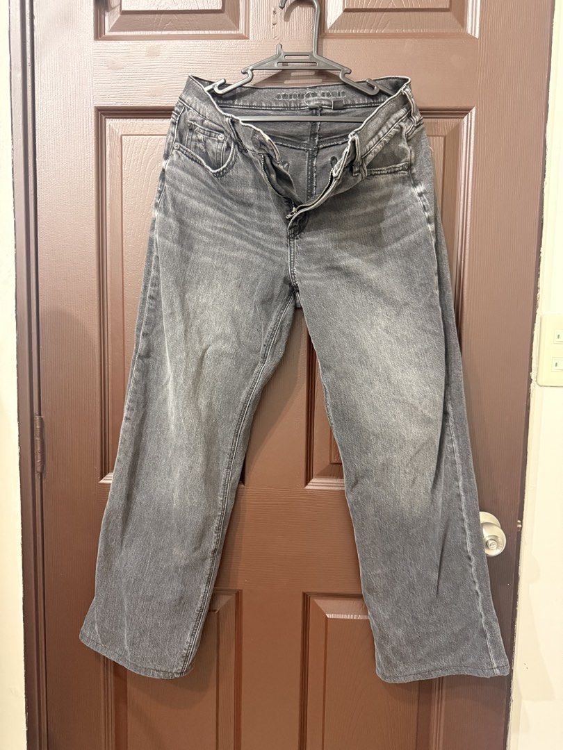 American Eagle Grey Denim Jeans (Category: Jeans) located in Pasay City. Submitted by annythingz28 (Listing ID 1470666714, Image 1). Description: - Brand: American Eagle - Color: Grey with washed denim finish - Fit: Relaxed straight leg - Closure: Button fly with zipper - Details: Slight distressing at front pocket edges - Style: Classic and versatile, perfect for everyday wear with tees or hoodies - Condition: Excellent (hang-dried).