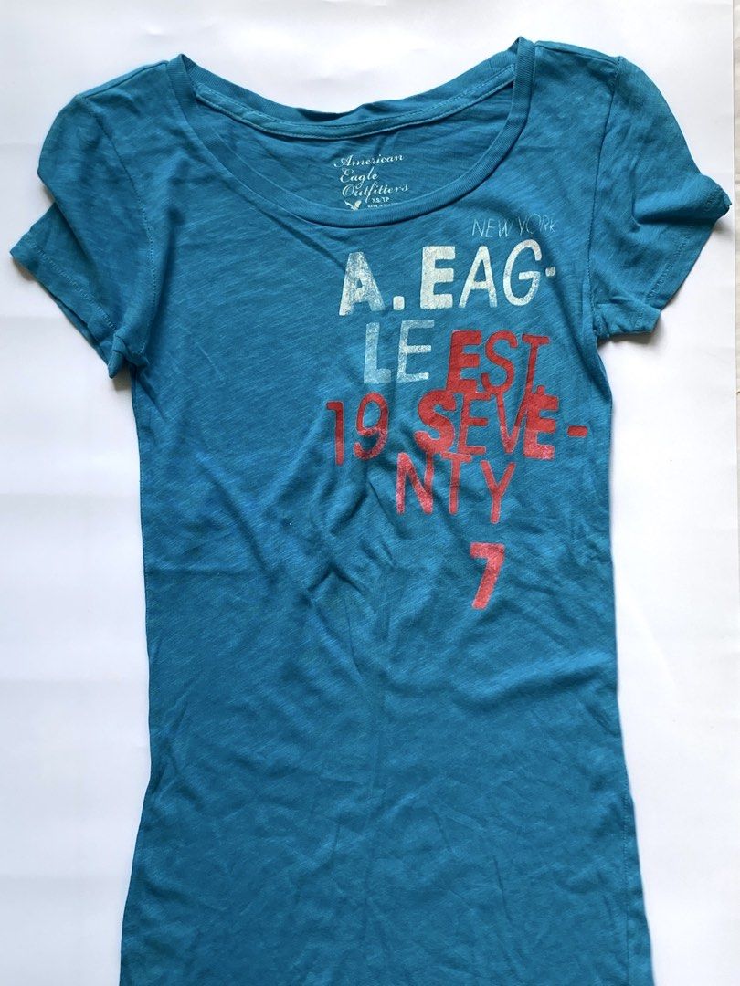 American Eagle Outfitters Teal Graphic Tee (Category: Shirts) located in Manila. Submitted by petalfinds_ (Listing ID 1470644004, Image 1). Description: ˚⊱🪷⊰˚ turquoise vintage fitted shirt ౨ৎ 𝐛𝐫𝐚𝐧𝐝: american eagle outfitters ౨ৎ 𝐬𝐢𝐳𝐞: xs to small 🫧⋆｡˚ 𝐝𝐞𝐭𝐚𝐢𝐥𝐬: GANDAAAAA! very y2k vibes! no issue! ─── ⋆⋅☆⋅⋆ ── 「 ✦ 𝐍𝐎 𝐂𝐎𝐃𝐄, 𝐈𝐍𝐕𝐀𝐋𝐈𝐃 𝐌𝐈𝐍𝐄 ✦ 」 𝓹𝓻𝓲𝓬𝓮: 149 𝓬𝓸𝓭𝓮: mirage.