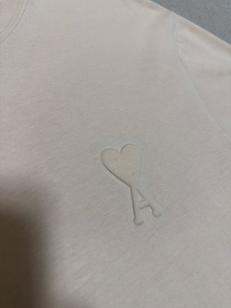 AMI Embossed Logo Tee (Category: Luxury Apparel) located in Bulacan. Submitted by sanjisthrift (Listing ID 1470653033, Image 3). Description: Size XL Oversized Width 23 Length 30 Excellent Condition 9/10 Need wash.