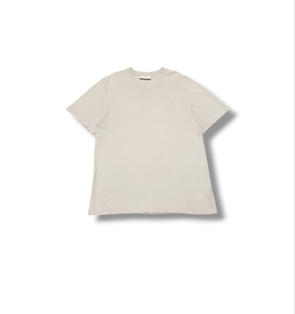 AMI Embossed Logo Tee (Category: Luxury Apparel) located in Bulacan. Submitted by sanjisthrift (Listing ID 1470653033, Image 1). Description: Size XL Oversized Width 23 Length 30 Excellent Condition 9/10 Need wash.