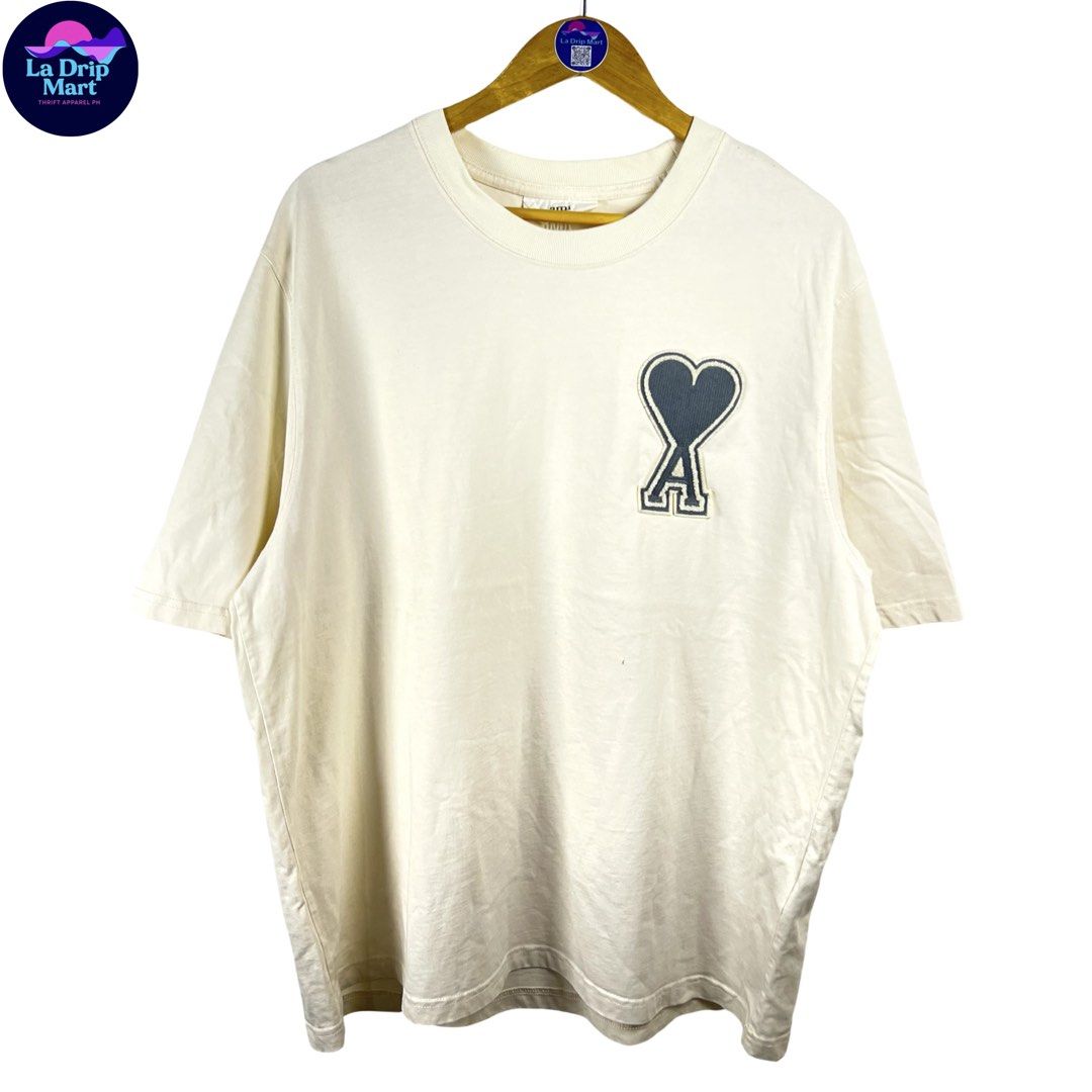 ‎“AMI PARIS” DE COUER CARPET LOGO TEE (Category: Tshirts & Polo Shirts ) located in Taguig. Submitted by ldm.ph (Listing ID 1470726615, Image 1). Description: ‎(LDM-C-0273) ‎Size:ACTUAL FIT:XL-XXL ‎Dimensions ‎Inches width:25 ‎Inches length:29 ‎Condition: EXCELLENT ‎Color rate:9.5 ‎Flaws:repaired pinhole ‎(READY TO WEAR) .