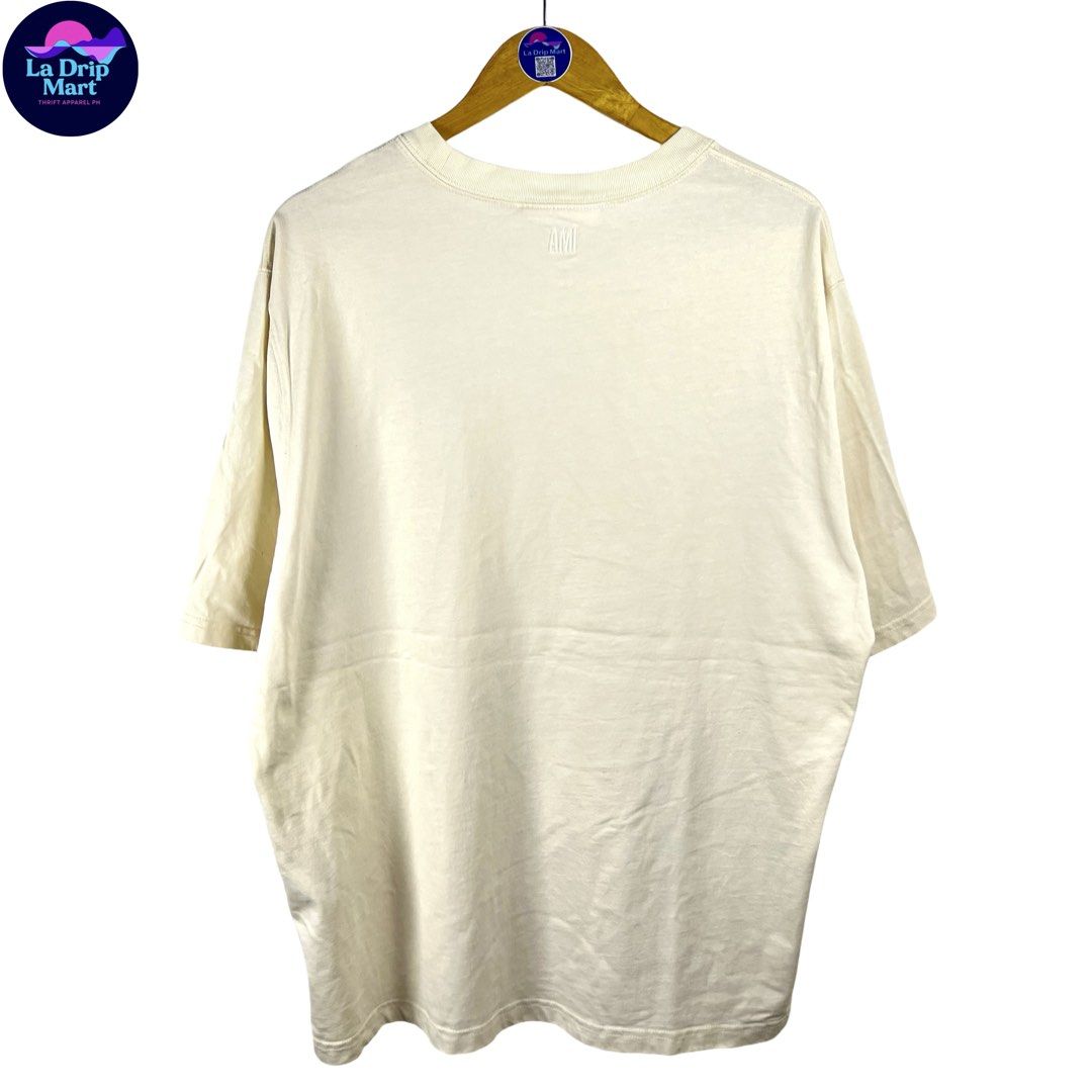 ‎“AMI PARIS” DE COUER CARPET LOGO TEE (Category: Tshirts & Polo Shirts ) located in Taguig. Submitted by ldm.ph (Listing ID 1470726615, Image 2). Description: ‎(LDM-C-0273) ‎Size:ACTUAL FIT:XL-XXL ‎Dimensions ‎Inches width:25 ‎Inches length:29 ‎Condition: EXCELLENT ‎Color rate:9.5 ‎Flaws:repaired pinhole ‎(READY TO WEAR) .