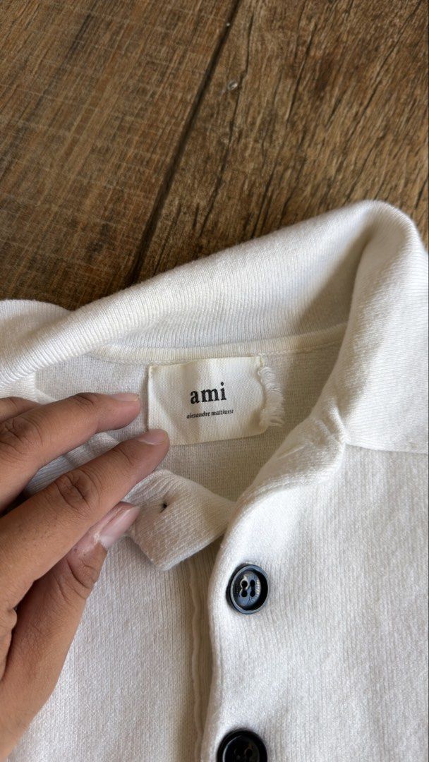 AMI WHITE POLO LONGSLEEVE (Category: Coats, Jackets and Outerwear) located in Manila. Submitted by urban.vintage (Listing ID 1470588043, Image 3). Description: ISSUE: NONE (NEED WASH) MOP :GCASH (NO COD) SHIP VIA: LALAMOVE & J&T LOCATION: PASIG CITY LENGTH: 25 WIDTH : 22.