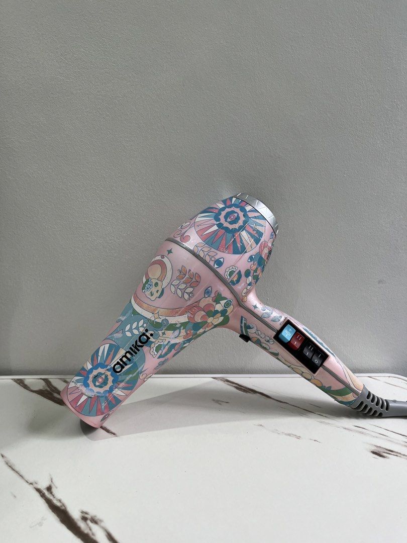 Amika Power Cloud Professional Hair Dryer (Category: Hair) located in Bacacay. Submitted by aiksgoods (Listing ID 1470594893, Image 1). Description: Visible signs of use, in good condition.