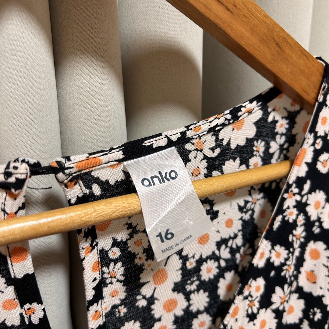 Anko Black Floral Daisy Print Romper (Category: Rompers) located in Rizal. Submitted by from99abovecloset (Listing ID 1470607449, Image 2). Description: Size: XL-2XL Armhole (laid flat):13” Bust (around): 44-46” Length (laid flat): 37” Soft rayon cotton | stretchy | like new .