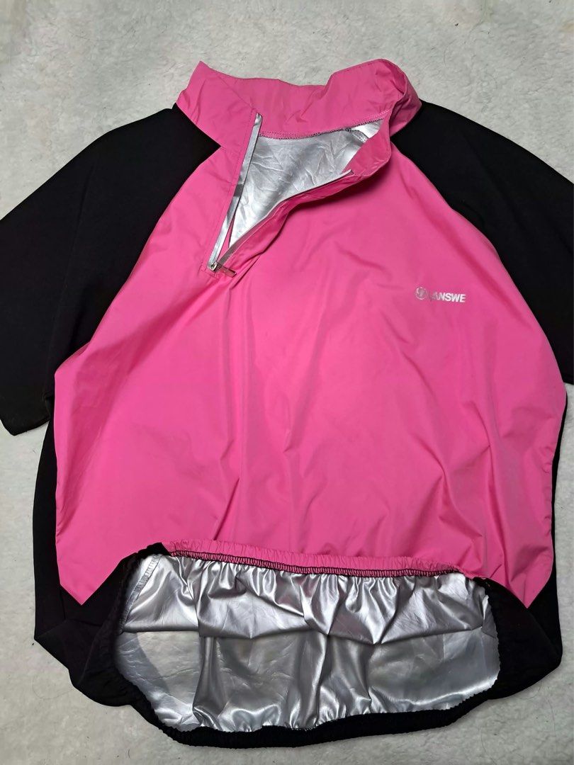 ANSWE Pink and Black Half Zip Jacket (Category: Coats, Jackets and Outerwear) located in Baguio. Submitted by padisellsz (Listing ID 1470645611, Image 2). Description: - Brand/Model: ANSWE half zip jacket - Very good condition - No issues - Colorway: Pink and black - Design: Short sleeves with mock neck collar - Warmth: Silver inner lining for heat retention - Fit: Elastic hem at bottom for a secure fit - Size: Approximately 21 x 24.5 inches.