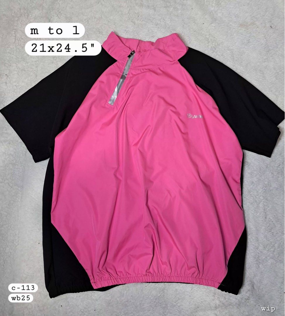 ANSWE Pink and Black Half Zip Jacket (Category: Coats, Jackets and Outerwear) located in Baguio. Submitted by padisellsz (Listing ID 1470645611, Image 1). Description: - Brand/Model: ANSWE half zip jacket - Very good condition - No issues - Colorway: Pink and black - Design: Short sleeves with mock neck collar - Warmth: Silver inner lining for heat retention - Fit: Elastic hem at bottom for a secure fit - Size: Approximately 21 x 24.5 inches.