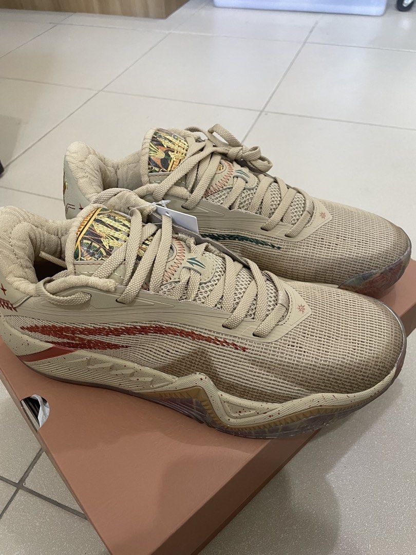 ANTA Kai 3 “Mastery” (Category: Sneakers) located in Manila. Submitted by sellwithbelly (Listing ID 1470594159, Image 2). Description: - Brand: Anta Kyrie Irving Kai 1 - Colorway: Tan / Multi-color - Condition: Brand new with original tags and matching box - Upper: Textured mesh with embroidered lightning bolt branding - Outsole: Colorful patterned translucent outsole with visible carbon fiber shank plate - Details: Special graphic tongue tags an