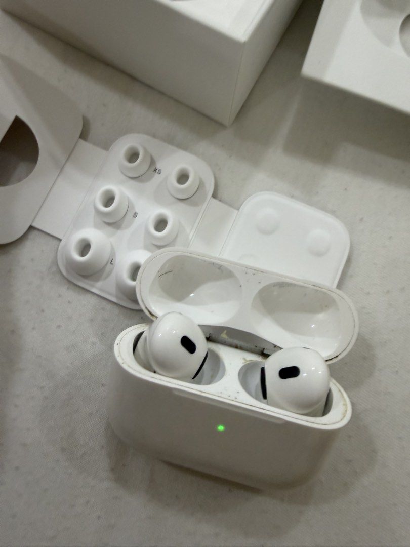Apple AirPods Pro 2nd Generation with MagSafe Charging Case (Category: Headphones & Headsets) located in Quezon City. Submitted by closetcleanupsale (Listing ID 1470566391, Image 2). Description: - Authentic Apple AirPods Pro 2nd Generation (White) - Includes MagSafe charging case, original box, and charging cable - Comes with complete extra ear tips (XS, S, L sizes) - Minor dust and dirt from normal use, works perfectly - DM for fast transaction