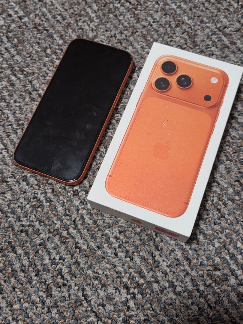 Apple iPhone17pro 256gb (Category: iPhone 17 Series) located in Manila. Submitted by thebestre (Listing ID 1470569347, Image 2). Description: - Color/Design: Vibrant orange with a cute Kitty sticker decal on the triple camera bump - Battery Health: Excellent at 97% with only 242 cycle counts - History: First used in December 2025 - Inclusions: Comes complete with the original box packaging - Condition: Well-maintained and ready to use.