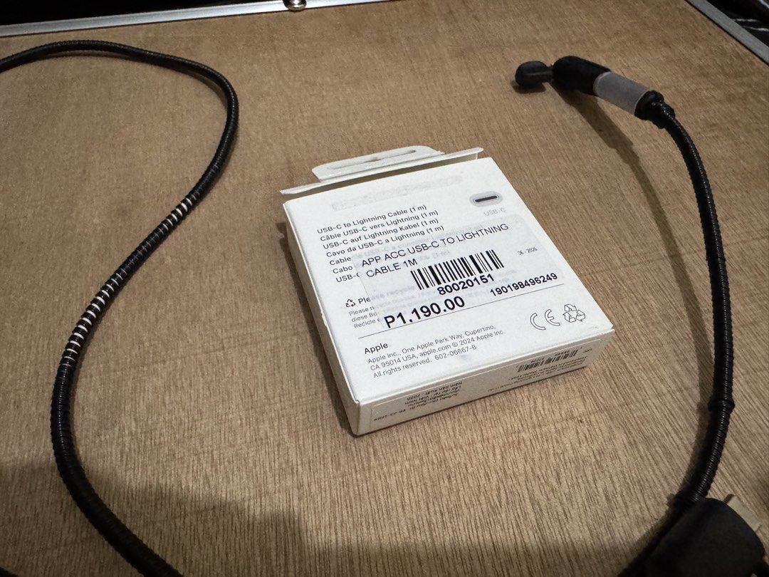APPLE USB-C To Lightnijg (Category: Chargers & Cables) located in Quezon City. Submitted by lordpsybucks (Listing ID 1470718754, Image 2). Description: Apple USB-C to Lightning Cable - Used only for 2 months since I bought a new phone. My previous phone was an Iphone 13 - Bought it at Digital Walker at SM Podium Mall - Comes with the Box and I gave a the black sleeve protection coil.