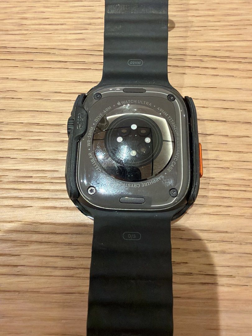 Apple Watch Ultra 49mm Titanium Black Ocean Band (Category: Wearables & Smart Watches) located in Singapore. Submitted by g4joe (Listing ID 1470680971, Image 2). Description: - Model: Apple Watch Ultra with 49mm titanium case and ceramic back - Connectivity & Durability: Cellular enabled, WR-100M water resistant, and dive-ready up to 40m - Display: Sapphire crystal display featuring the Wayfinder watch face - Included: Black ocean band (O/S) and 