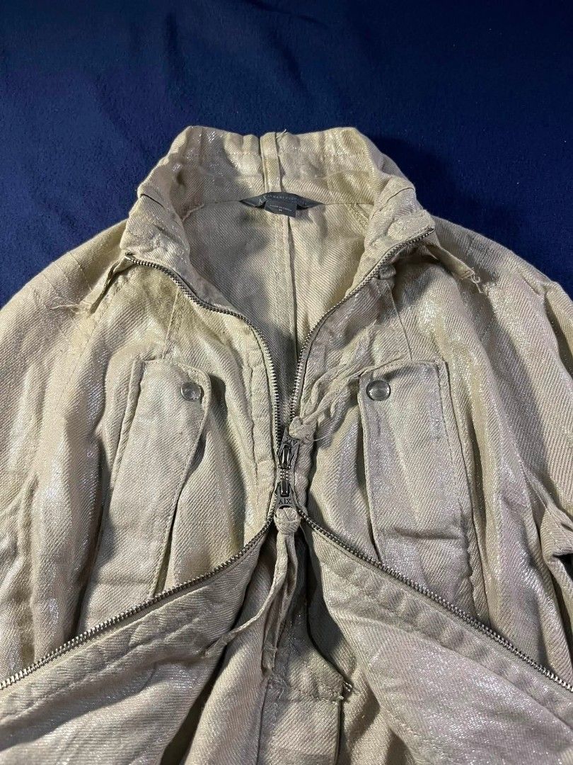 Archive Moto jacket ARMANI EXCHANGE (Category: Coats, Jackets and Outerwear) located in Zamboanga. Submitted by abubazir7 (Listing ID 1470726796, Image 3). Description: Archive Armani Exchange Vintage Moto Biker Jacket features a light gray/cream washed aesthetic, a double-zip front closure, zippered cuffs, a stand-up collar, and detailed snap-button flap chest pockets early-2000s Y2K utilitarian and cyber-grunge styles. Dimes Length " front 23 B