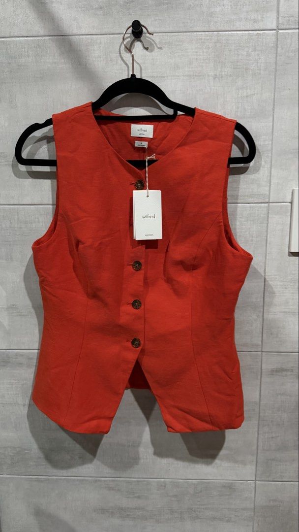 Aritzia Regal Vest Top (Category: Blouses) located in Cagayan de Oro. Submitted by christineeealexis (Listing ID 1470662041, Image 3). Description: Aritiza Regal Vest Top in Poppy Red Retails for 118USD 7.5k ++ BNWTG RSF: Decluttering Fits Med Frame +sf.
