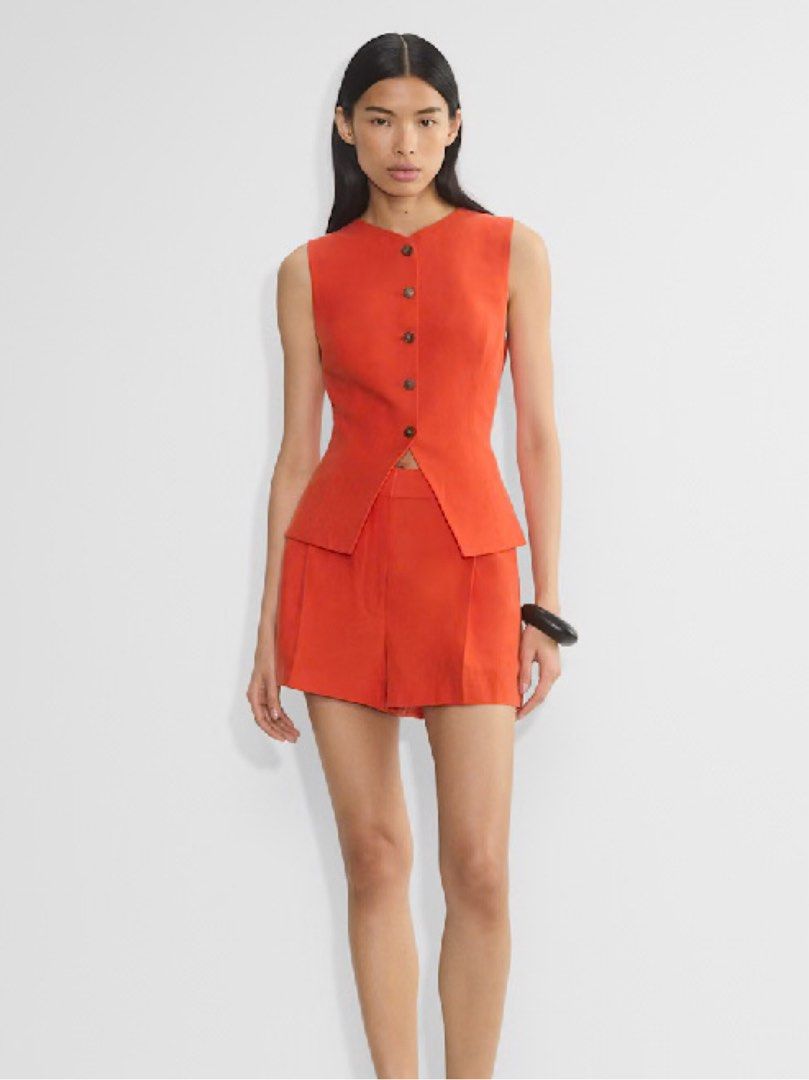 Aritzia Regal Vest Top (Category: Blouses) located in Cagayan de Oro. Submitted by christineeealexis (Listing ID 1470662041, Image 1). Description: Aritiza Regal Vest Top in Poppy Red Retails for 118USD 7.5k ++ BNWTG RSF: Decluttering Fits Med Frame +sf.