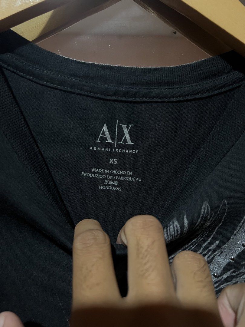 Armani Exchange Graphic slim fit shirt (Category: Shirts) located in Sibulan. Submitted by rustysbestpick (Listing ID 1470660687, Image 3). Description: Armani Exchange Graphic slim fit shirt Authenticity guaranteed (See tag authentication) Brand new/Excellent condition Washed and ready to wear No issues or flaws Size XS Dimes: 15x25 Retail price: 1,790 Taiwan dollar ( + 3,500.00 ₱) Selling price: 759 Free Shipping Loc: Sibulan, Negros Oriental V