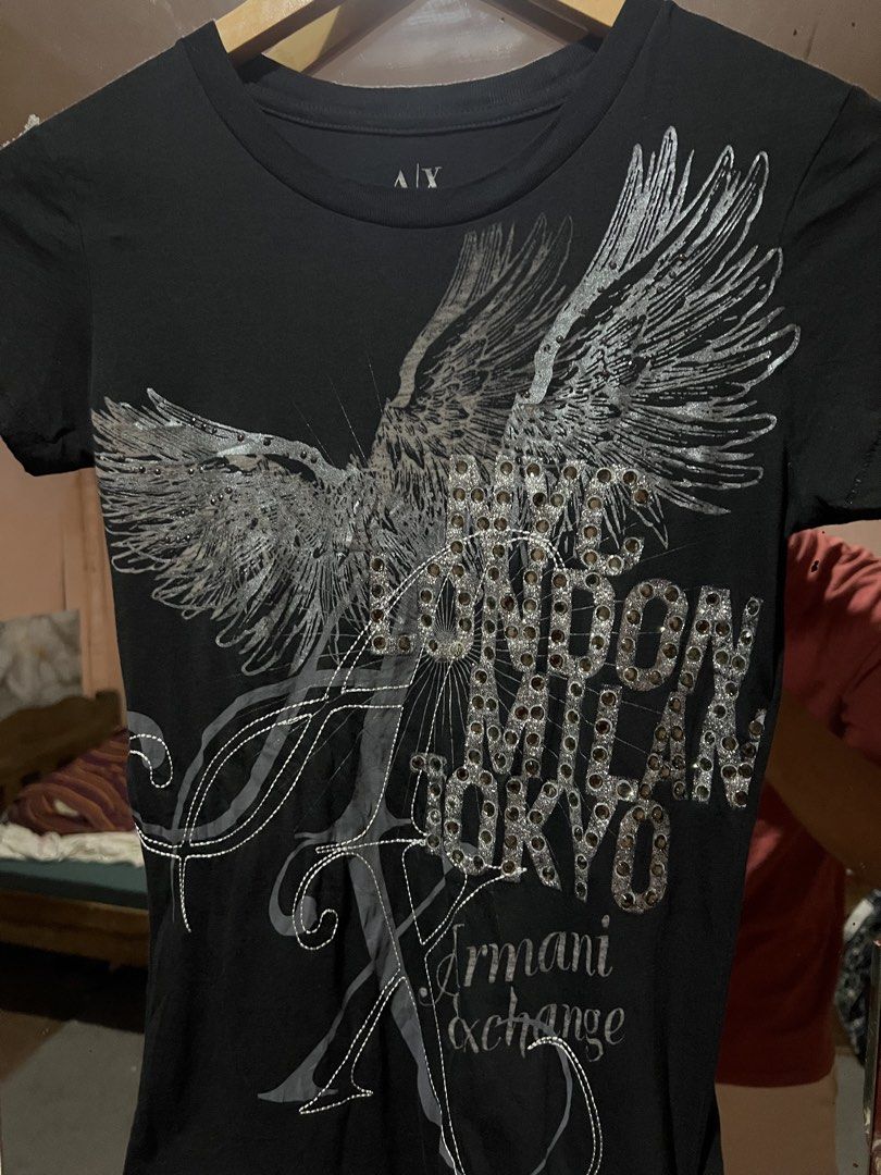 Armani Exchange Graphic slim fit shirt (Category: Shirts) located in Sibulan. Submitted by rustysbestpick (Listing ID 1470660687, Image 2). Description: Armani Exchange Graphic slim fit shirt Authenticity guaranteed (See tag authentication) Brand new/Excellent condition Washed and ready to wear No issues or flaws Size XS Dimes: 15x25 Retail price: 1,790 Taiwan dollar ( + 3,500.00 ₱) Selling price: 759 Free Shipping Loc: Sibulan, Negros Oriental V