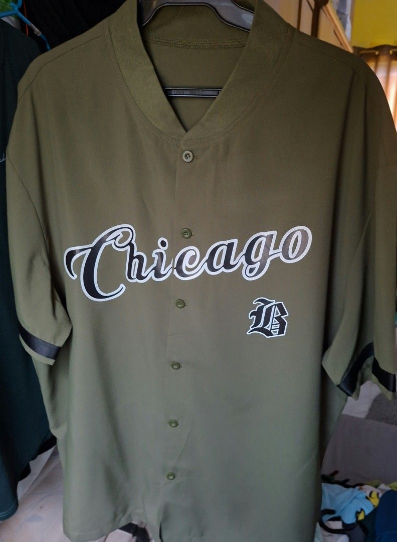 ARMY GREEN CHICAGO BASEBALL JERSEY SHIRT (Category: Tshirts & Polo Shirts ) located in Manila. Submitted by jevyyy (Listing ID 1470643246, Image 3). Description: FOR MEN AND WOMEN (UNISEX) fit Large to 2XL Color: ArmyGreen with white Chicago lettering and black outline Design: V-neck collar with buttons Material: Lightweight fabric ideal for layering Style: Casual streetwear.