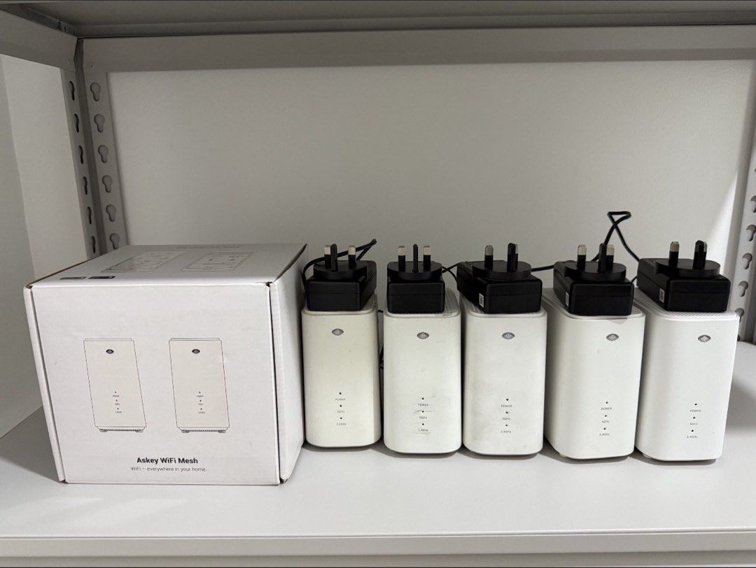 Askey AP5100W-D171 WiFi Mesh System 5 Units (Category: Networking) located in Mabalacat. Submitted by mark.196 (Listing ID 1470566046, Image 2). Description: - Model: Askey AP5100W-D171 WiFi Mesh System - Quantity: 5 units included for seamless whole-house coverage - Design: Clean white aesthetic that blends easily with home interiors - Power: Integrated UK three-pin plug power adapters (12V 2A rating) - Packaging: Original retail box included in